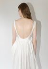 Róhe Sculptural Textured Cotton Dress in Off White. Long, v-neck dress with low back and gathered skirt. 