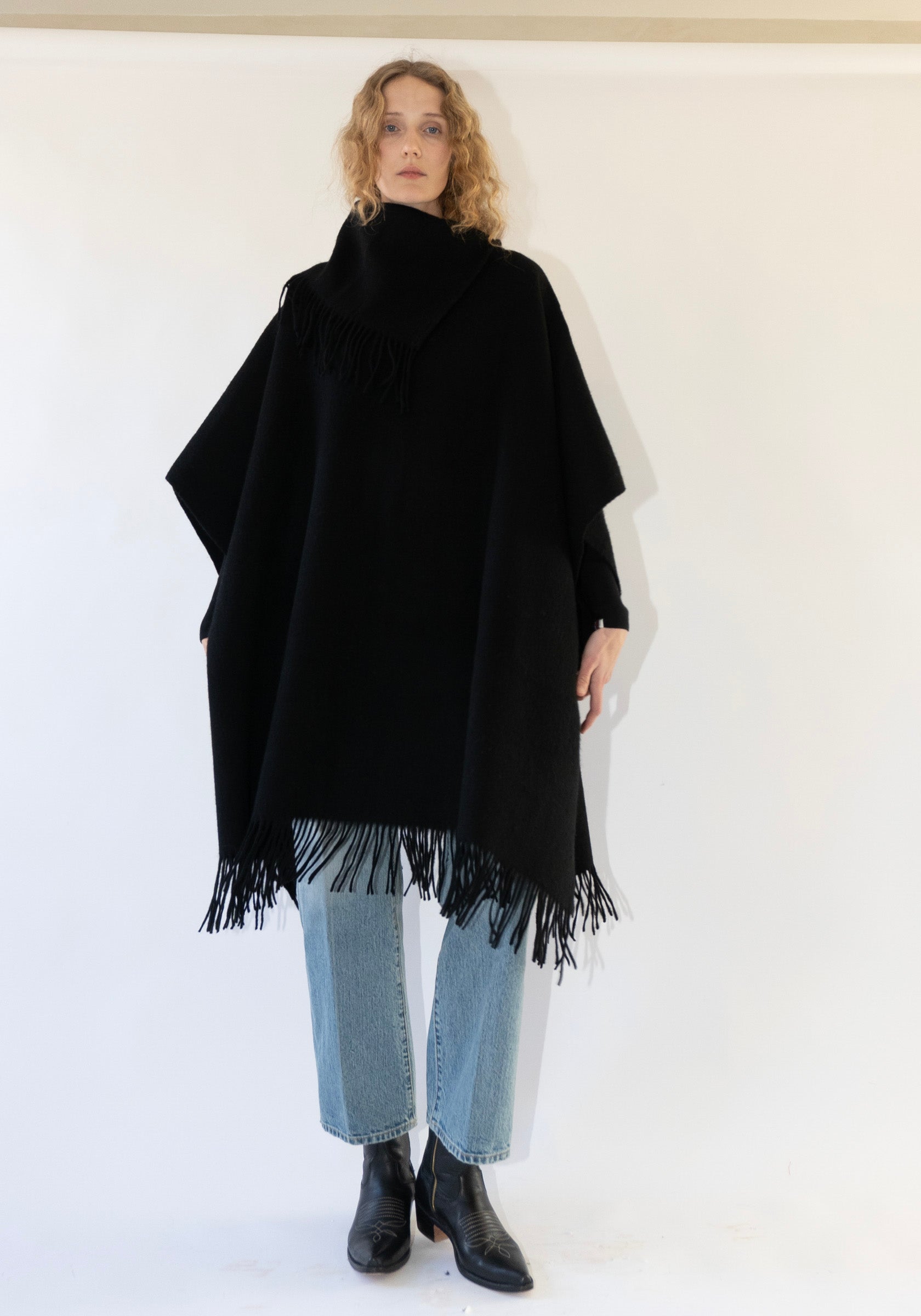 Long Turtlo Fringe Poncho in Black