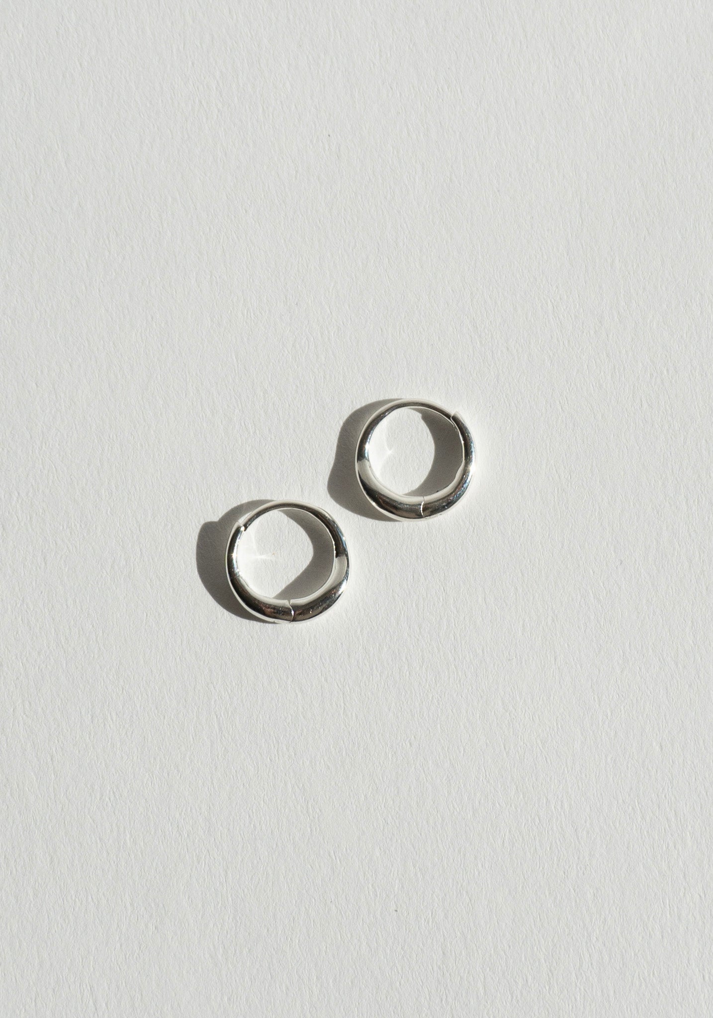 Nina Gordon Momento Baby Hoops in Silver

