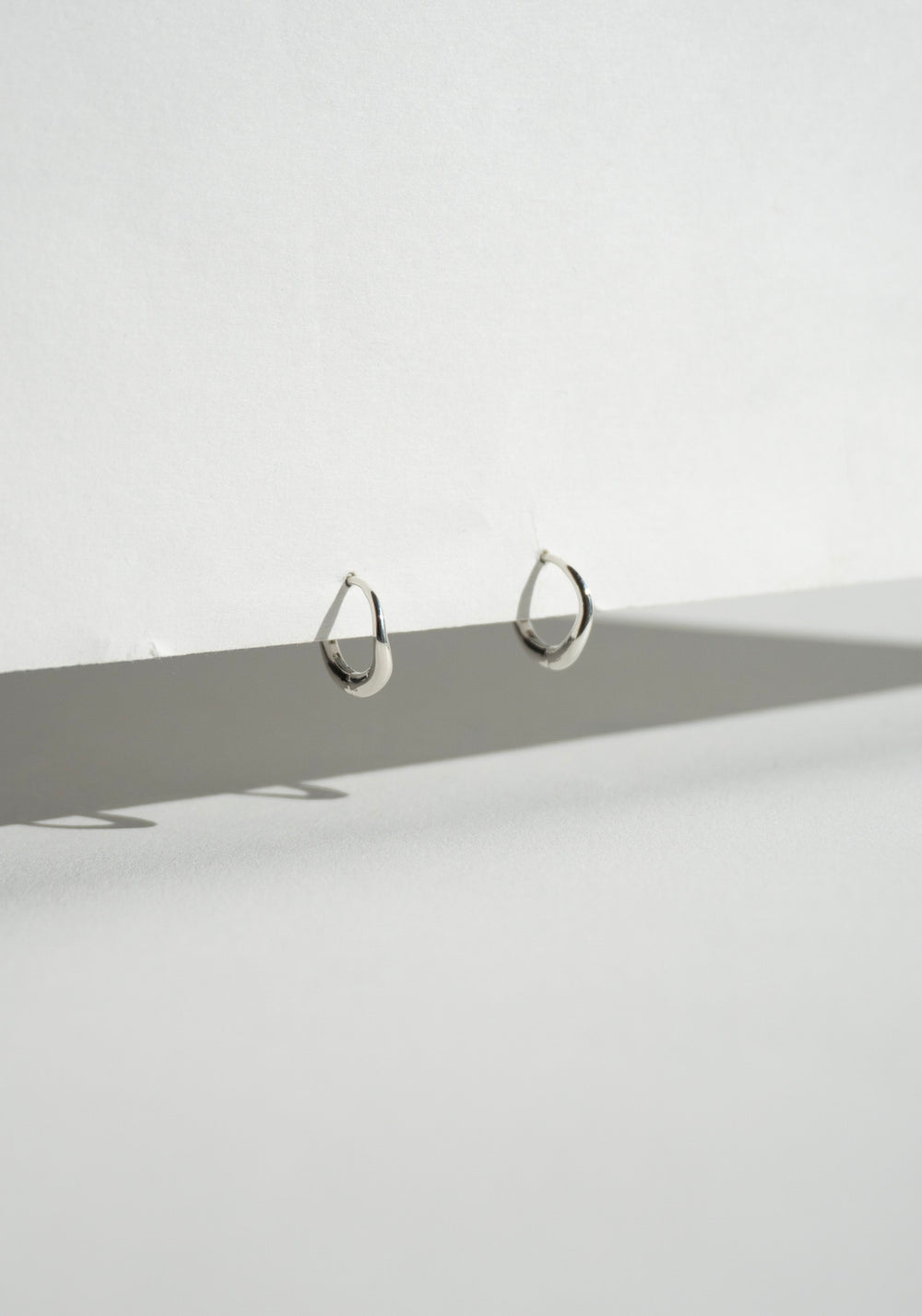 Nina Gordon Momento Baby Hoops in Silver