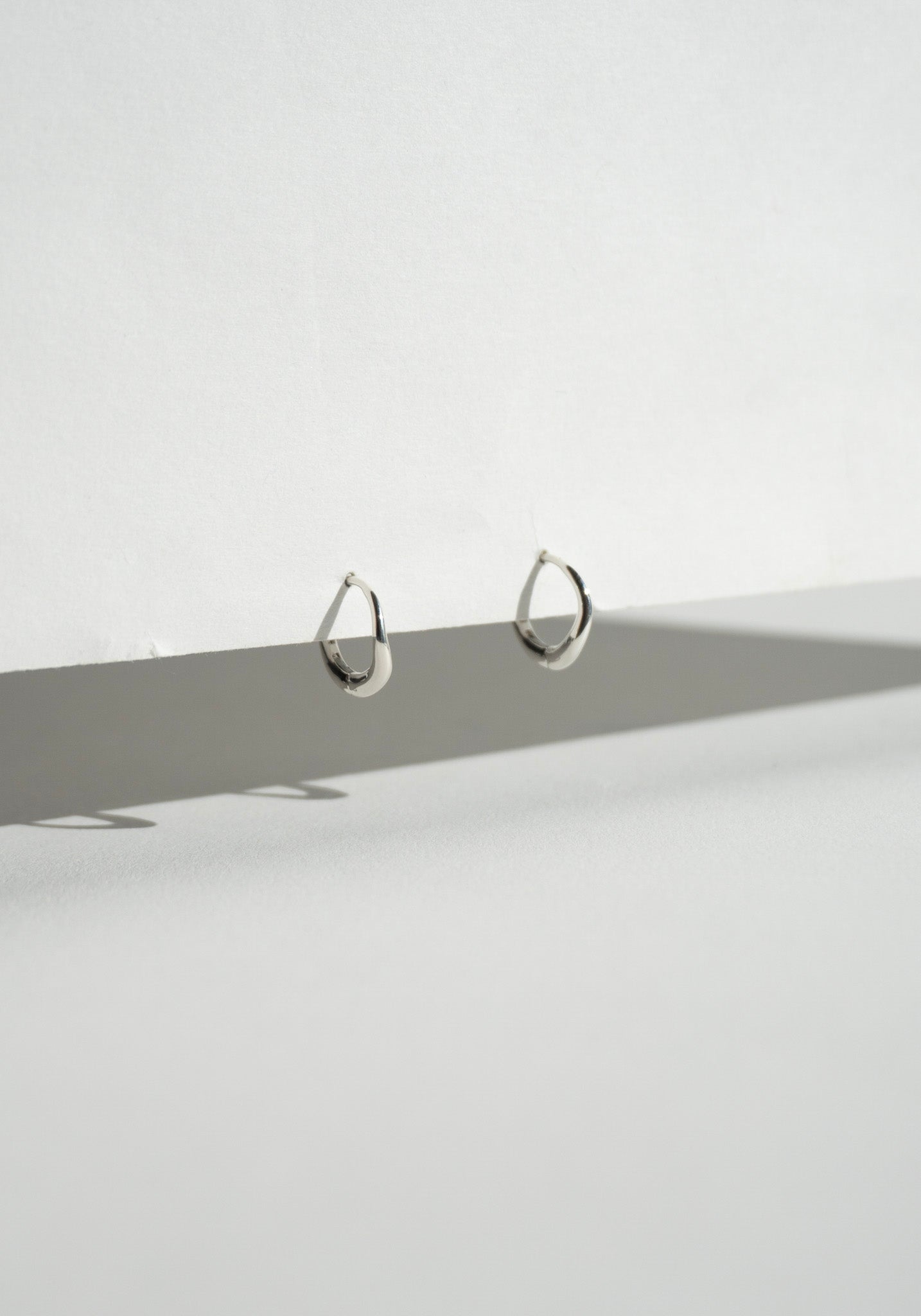 Nina Gordon Momento Baby Hoops in Silver