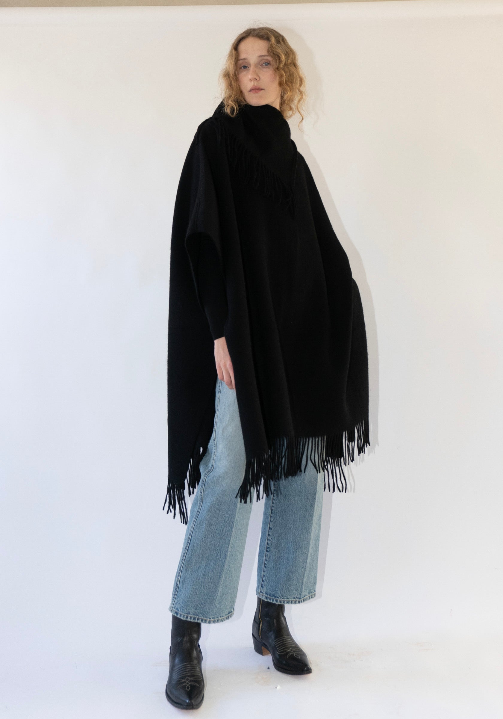 Long Turtlo Fringe Poncho in Black