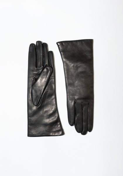 Sold Vintage black gloves. 100% Cashmere lining. Size Large. With fur.