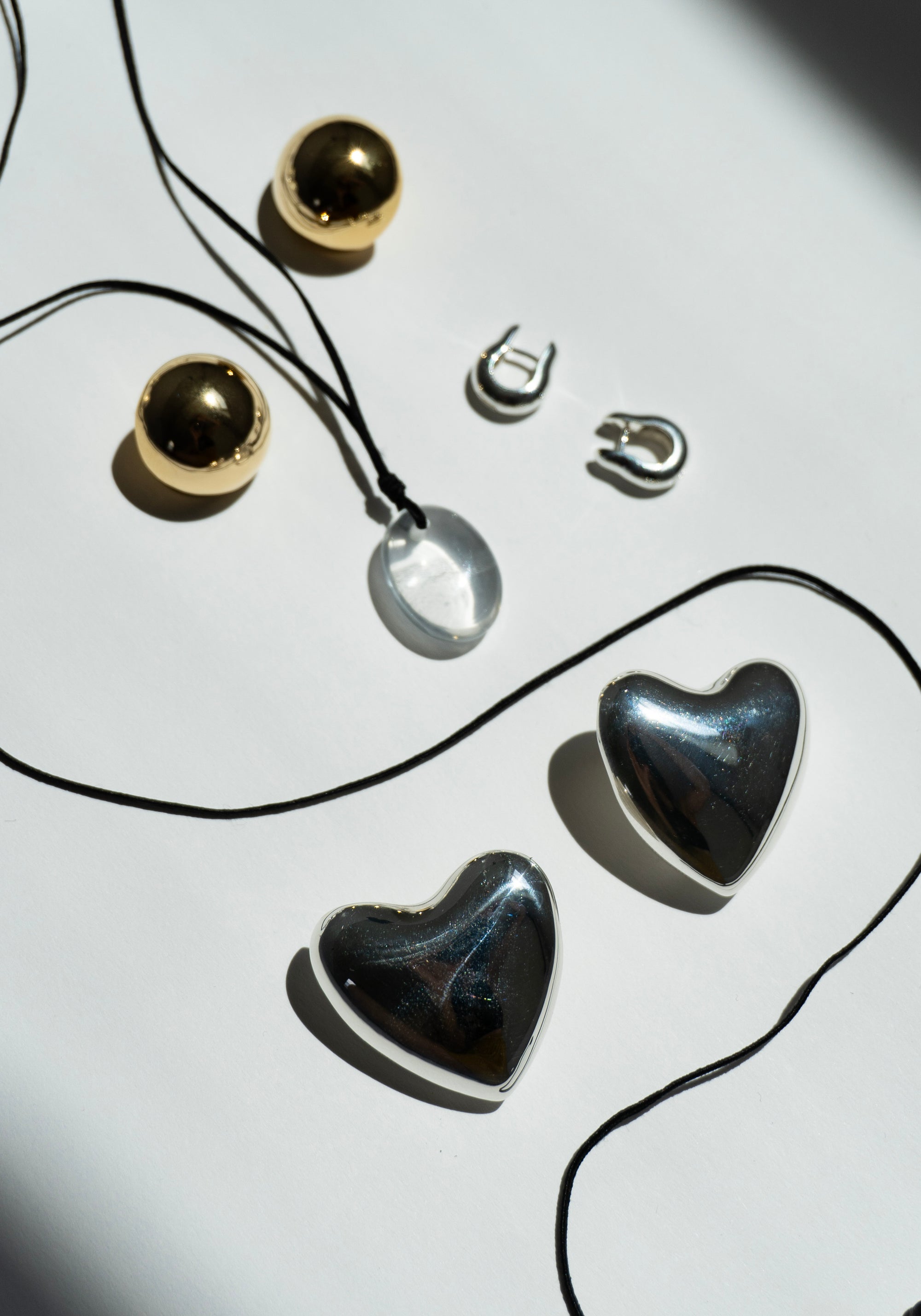 Annika Inez Voluptuous Heart Earrings in Silver