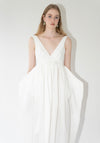 Róhe Sculptural Textured Cotton Dress in Off White. Long, v-neck dress with low back and gathered skirt. 