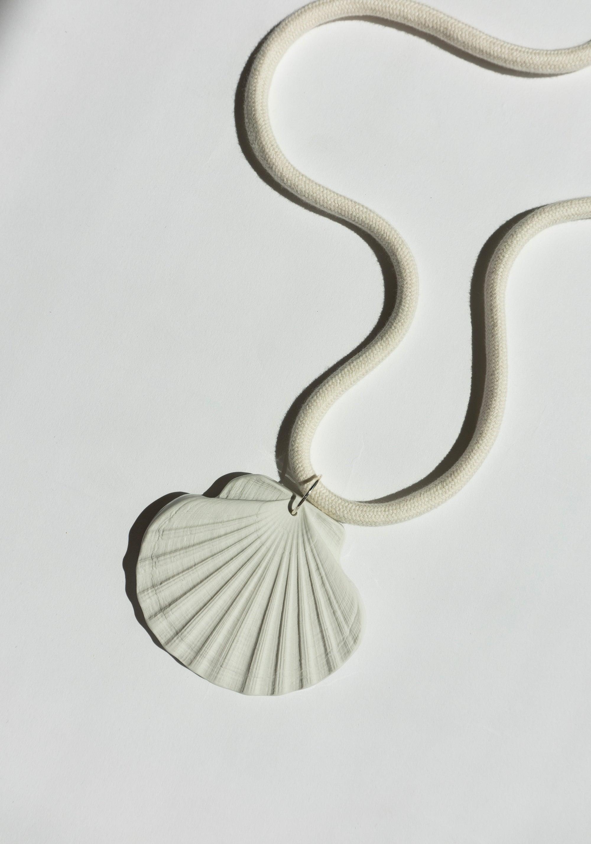 Porcelain Shell .07 Amulet