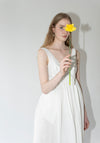 Róhe Sculptural Textured Cotton Dress in Off White. Long, v-neck dress with low back and gathered skirt. 