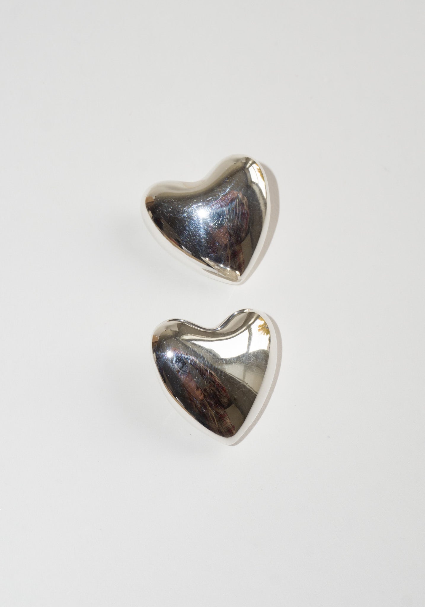 Voluptuous Heart Earrings in Silver