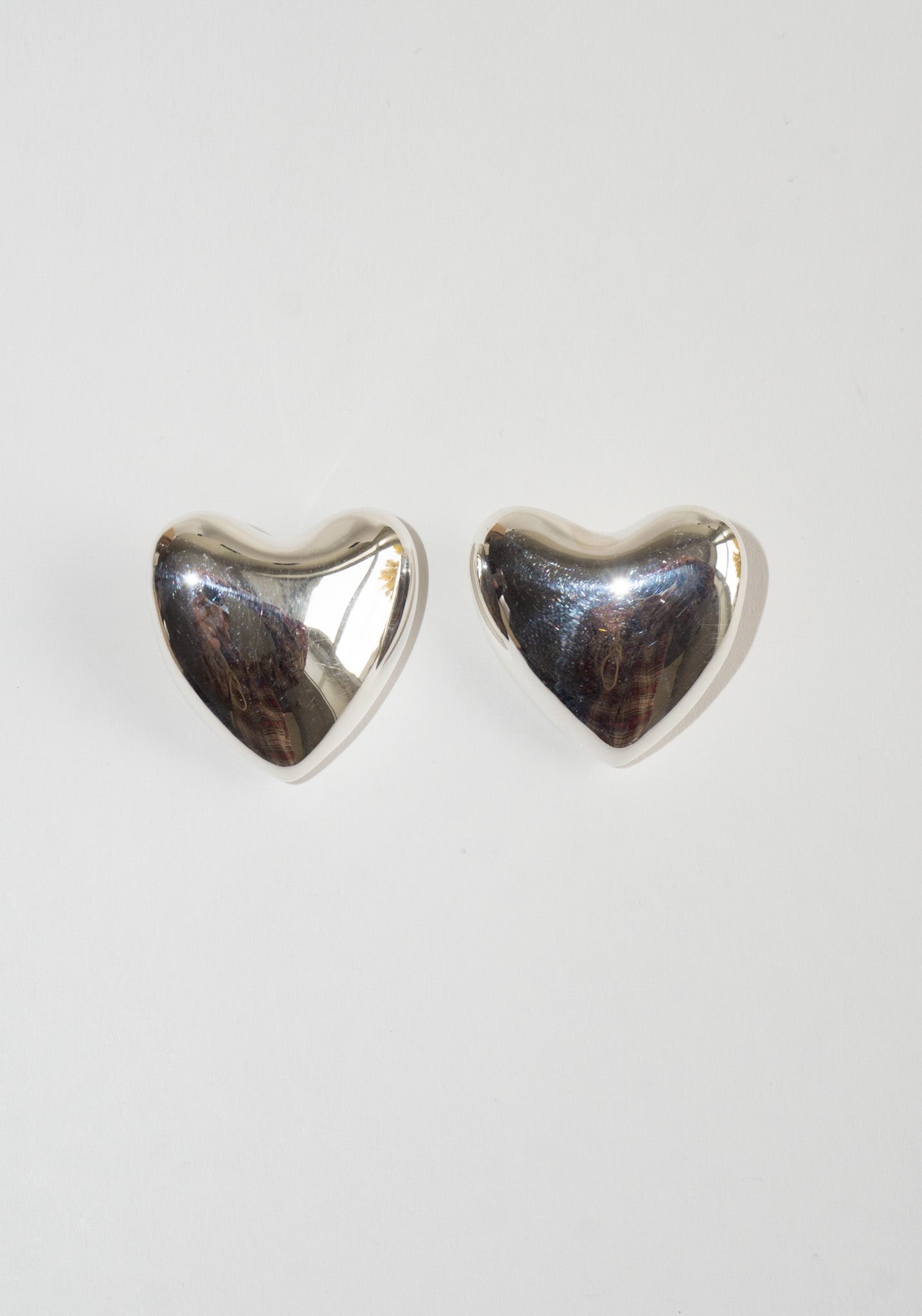 Voluptuous Heart Earrings in Silver