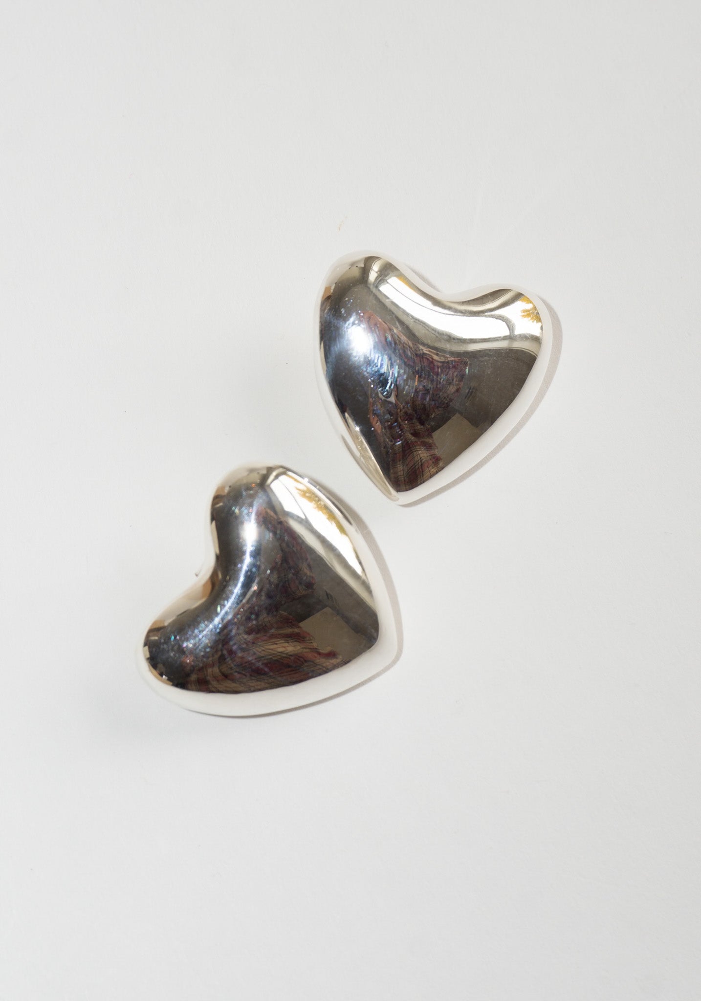 Voluptuous Heart Earrings in Silver