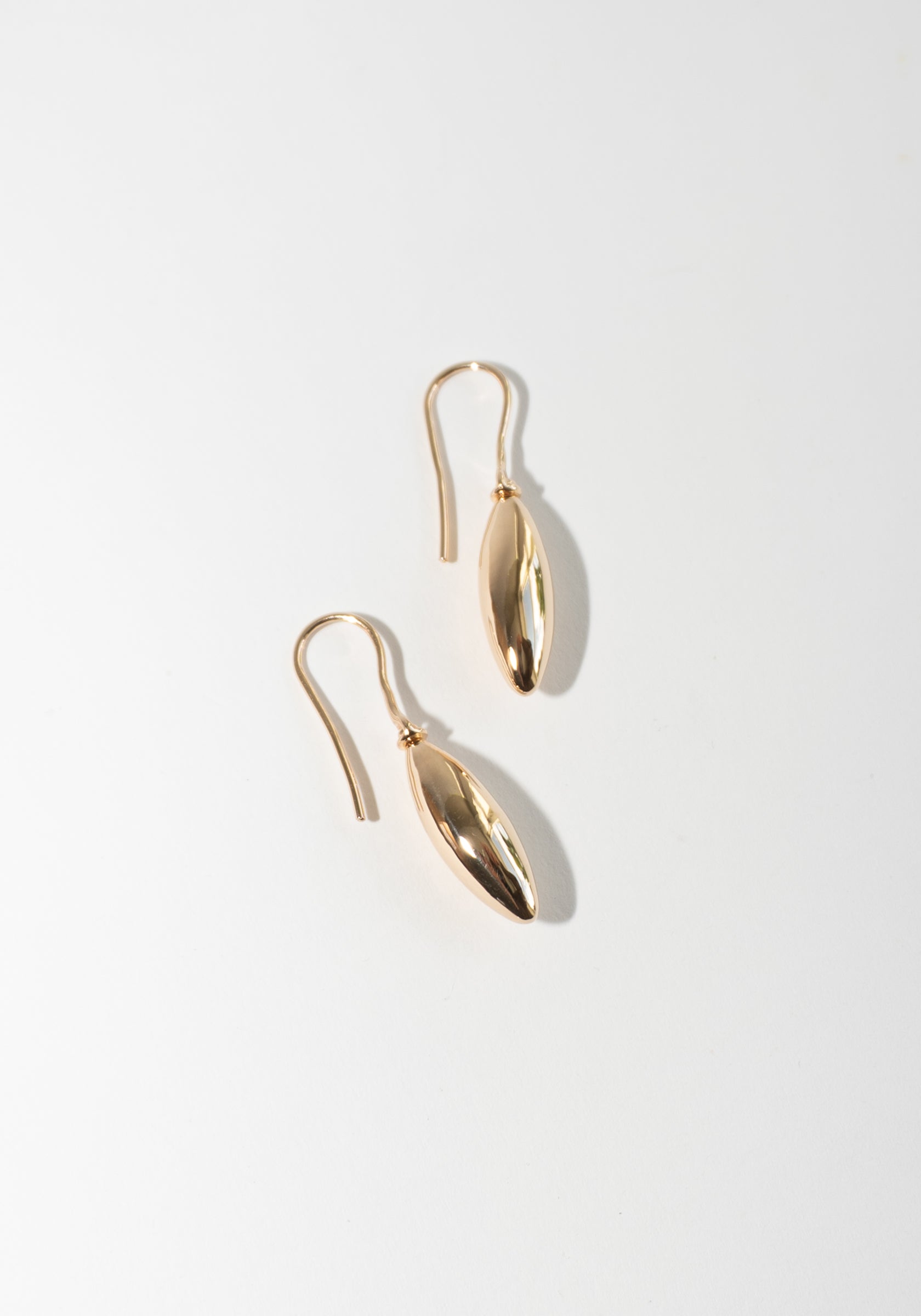 Small Elongated Ellipse Earrings in Gold