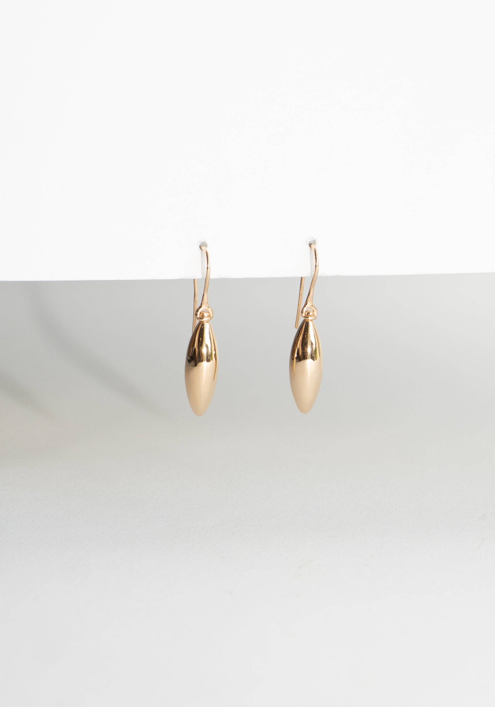 Small Elongated Ellipse Earrings in Gold