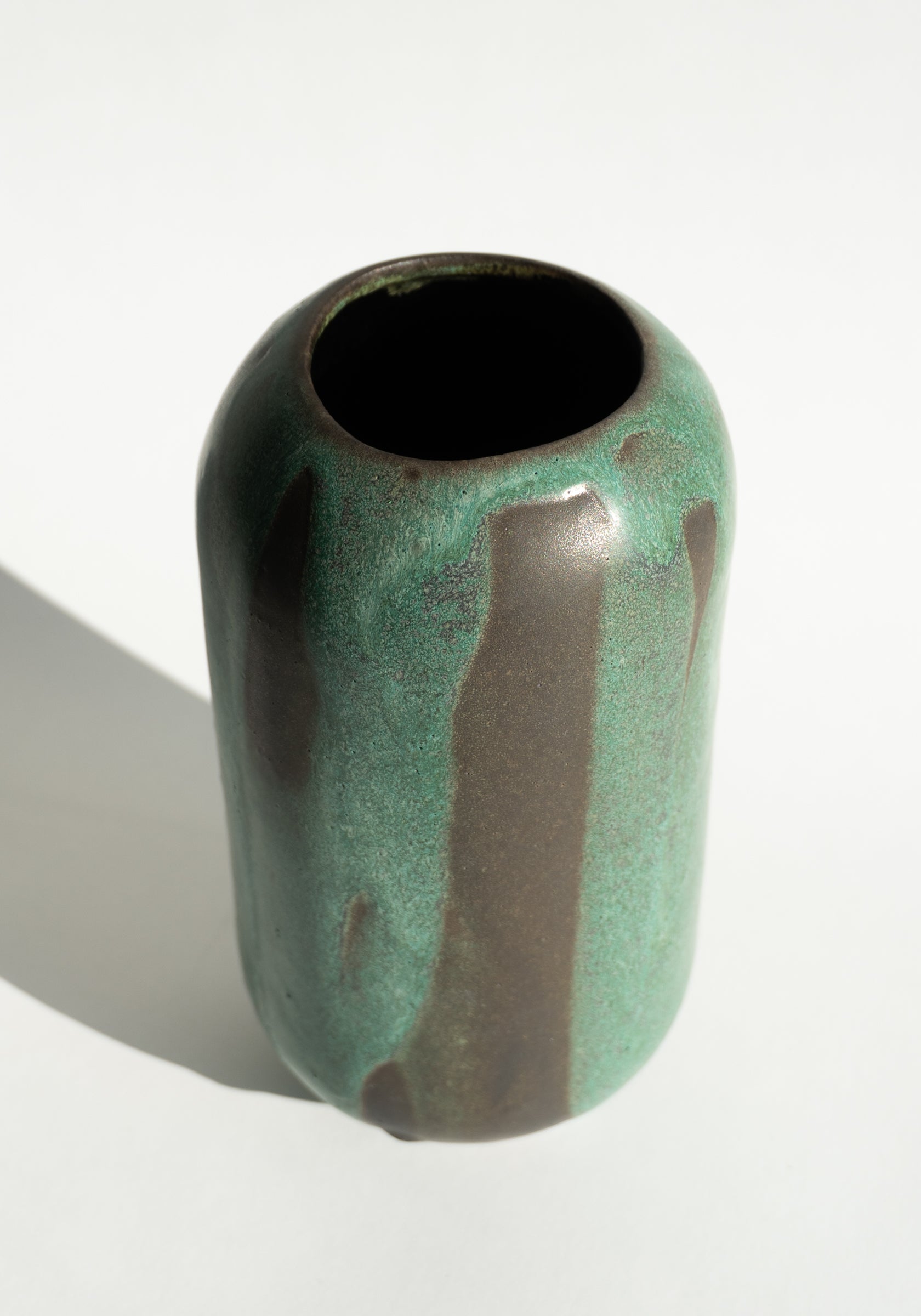 Mondays Ceramics Cylinder Vase in Green Patina on Umber