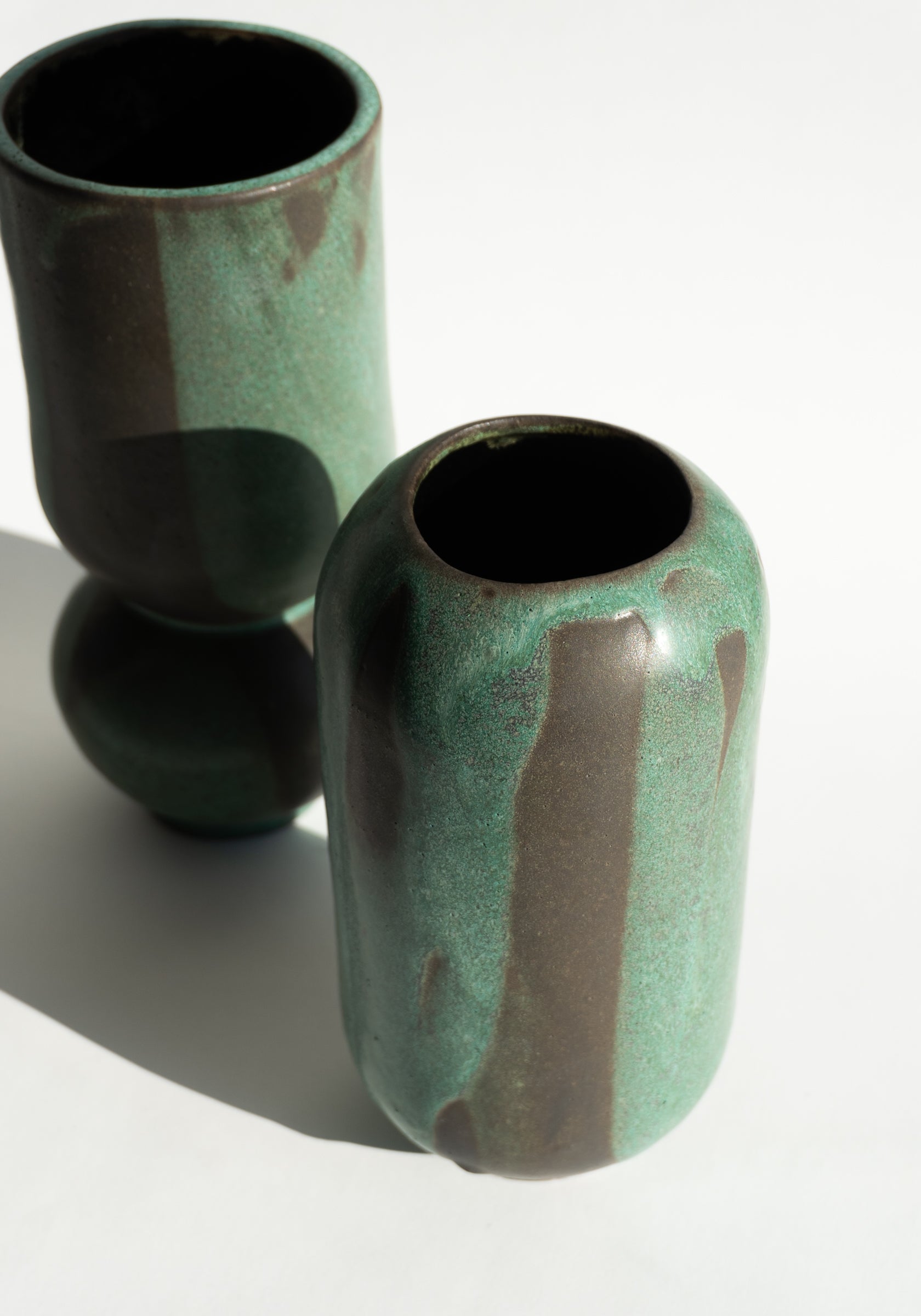 Mondays Ceramics Cylinder Vase in Green Patina on Umber