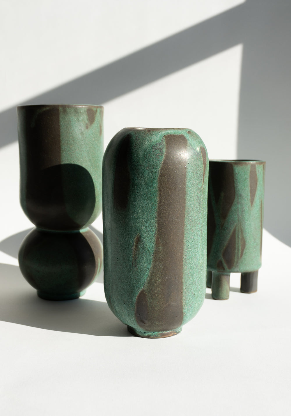 Mondays Ceramics Cylinder Vase in Green Patina on Umber