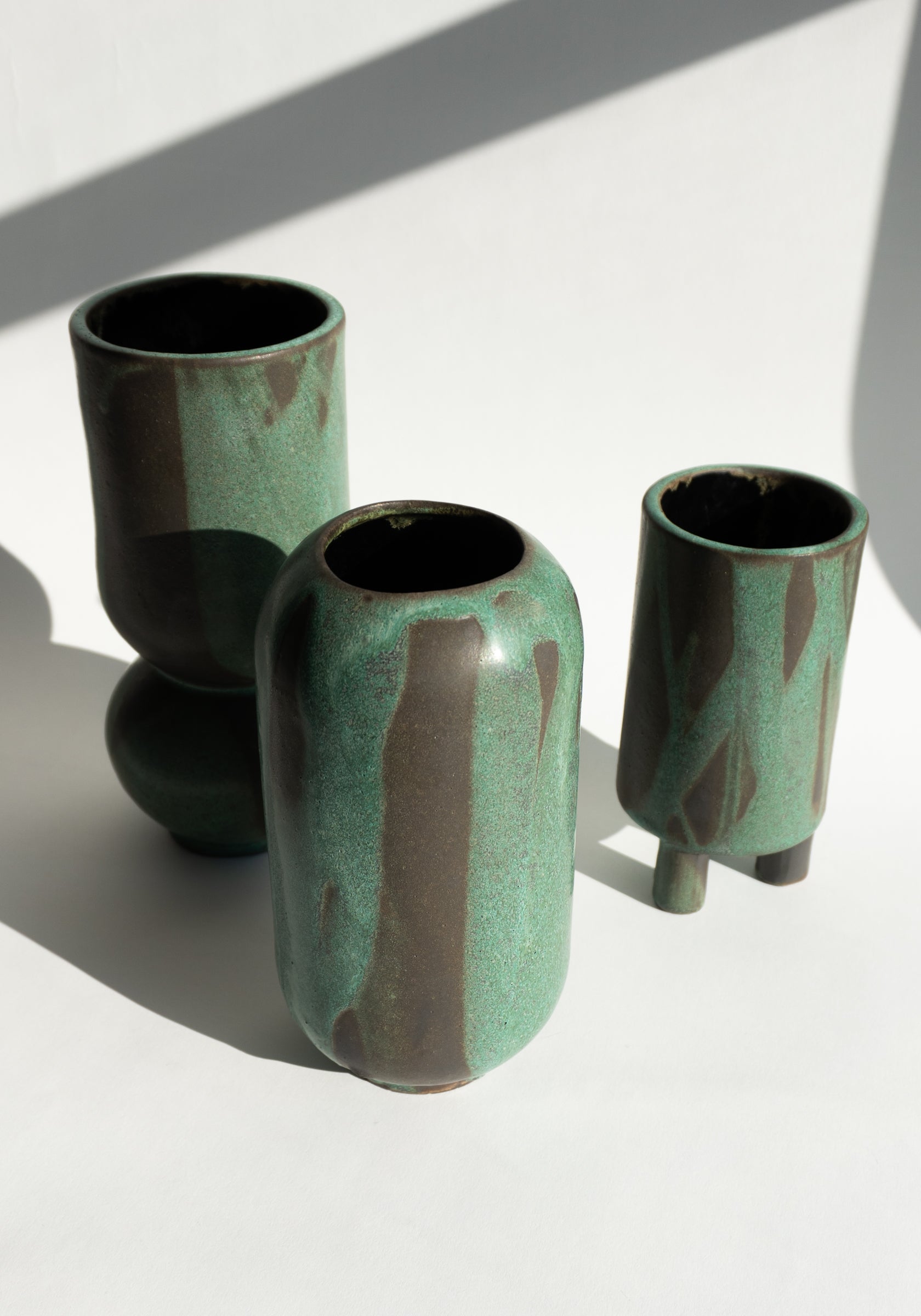 Mondays Ceramics Cylinder Vase in Green Patina on Umber