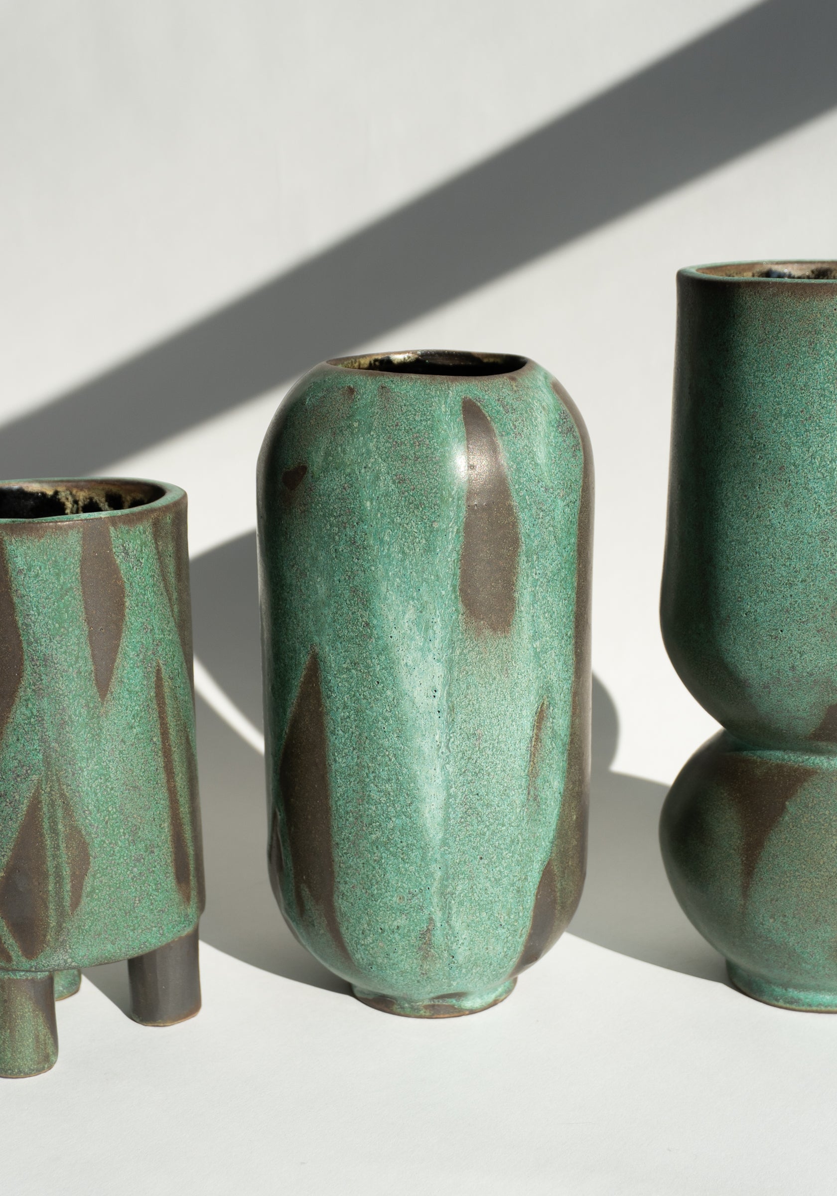 Mondays Ceramics Cylinder Vase in Green Patina on Umber