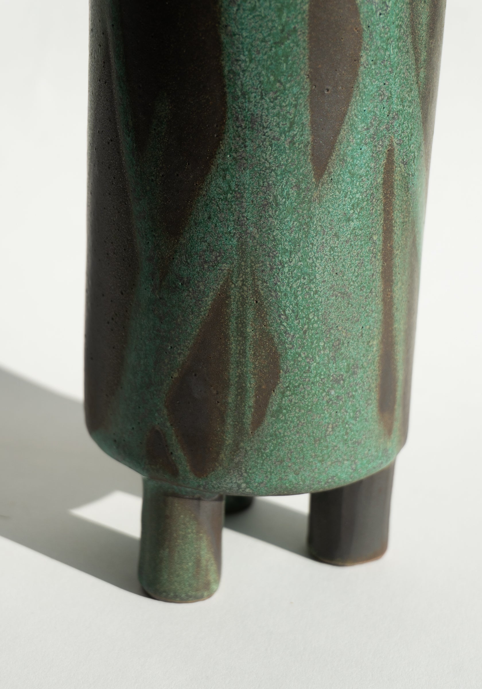 Mondays Ceramics Tripod Vase in Green Patina on Umber