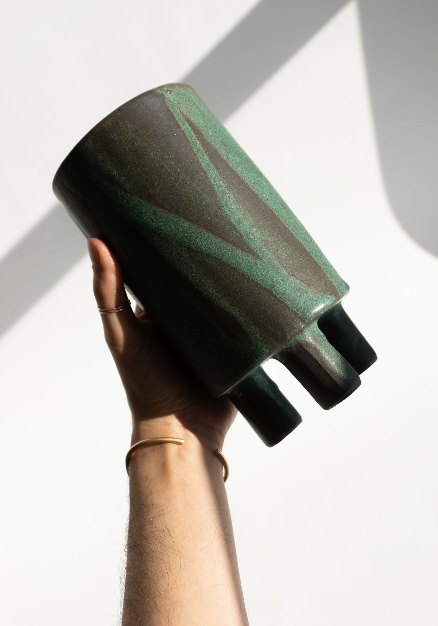 Mondays Ceramics Tripod Vase in Green Patina on Umber
