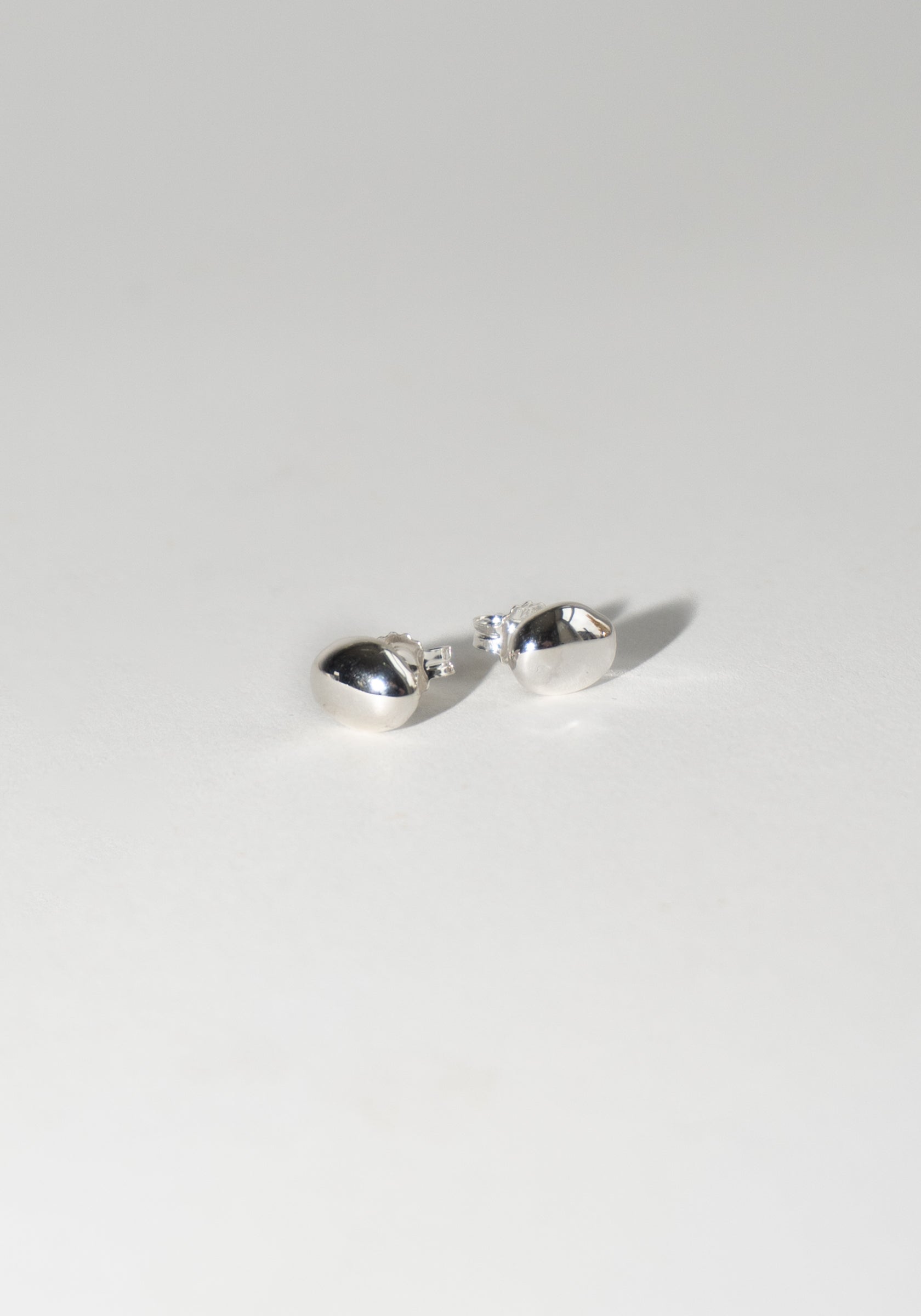 Figure Studs in Silver