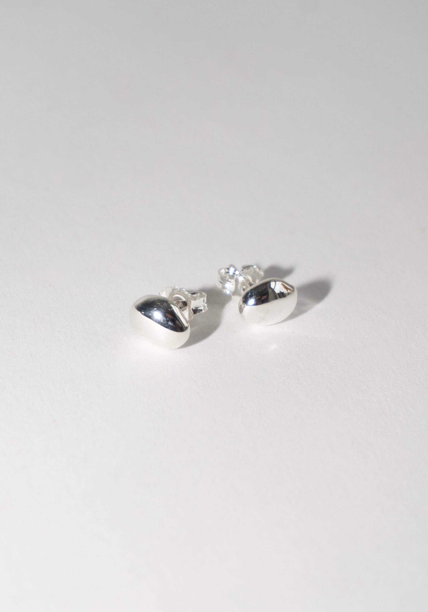 Figure Studs in Silver