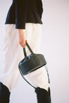 Cawley Leather Drawstring Collar Bag in Black